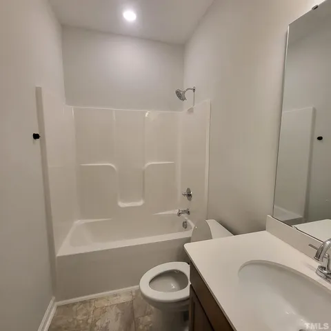 a view of a building with a big yard