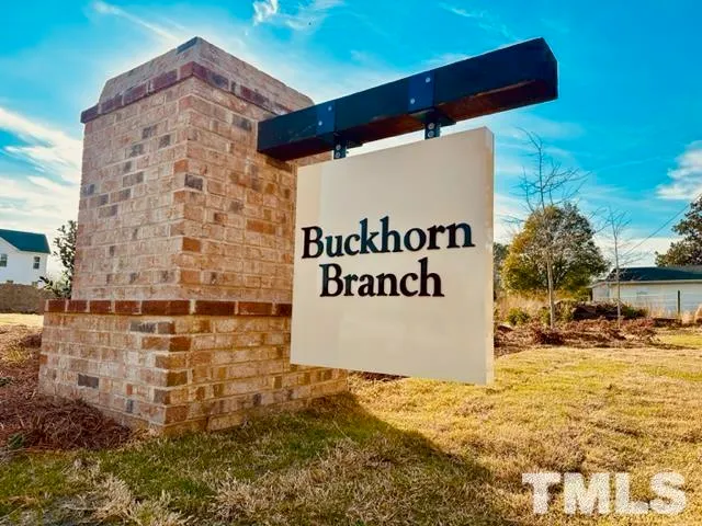 a view of a pool with a patio
