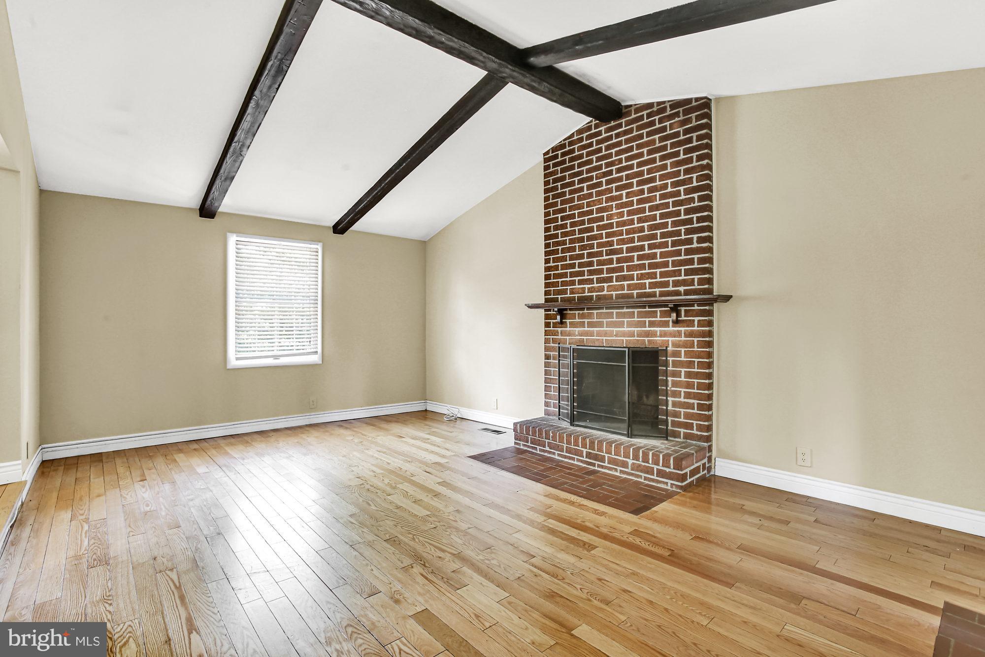 403 Trimble Road Joppa, MD 21085 - Photo 9 of 26 Family Room Fireplace
