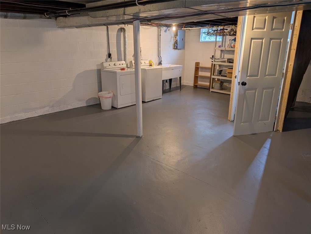 5860 Haber Road Vermilion, OH 44089 - Photo 27 of 31 Basement with washer and dryer and electric panel