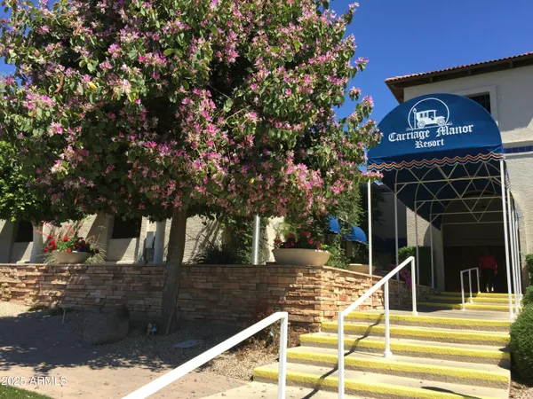a view of a street with sitting area