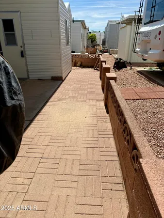 a view of a porch with wooden floor