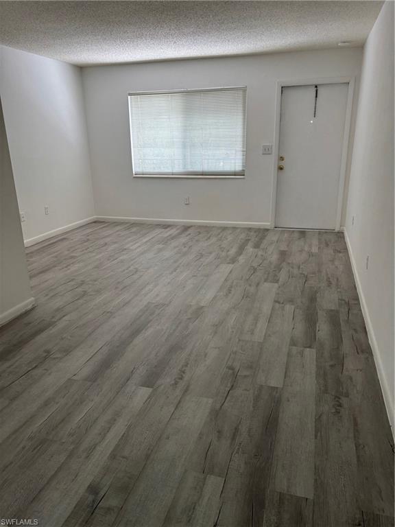 3250 10th Street North, Unit A8 Naples, FL 34103 - Photo 10 of 13 a view of an empty room