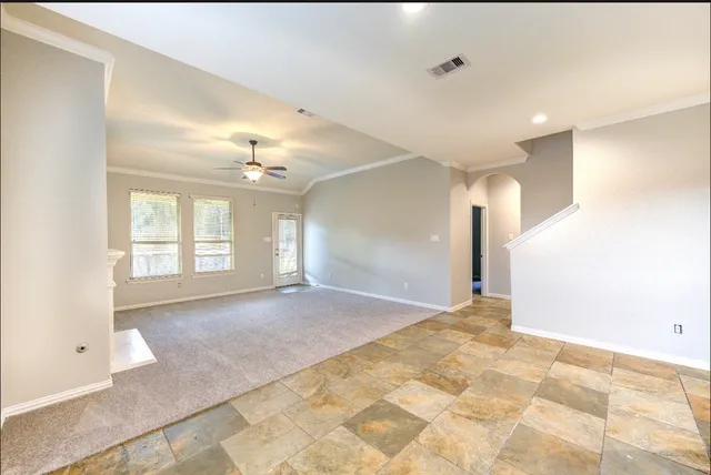 a view of a room with a fireplace