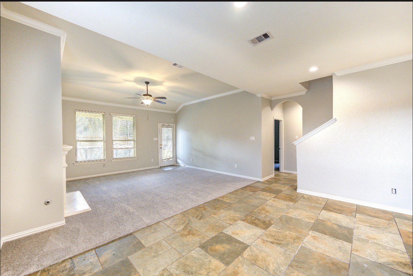 7 Maple Mill Court Conroe, TX 77301 - Photo 14 of 49 a view of livingroom and window