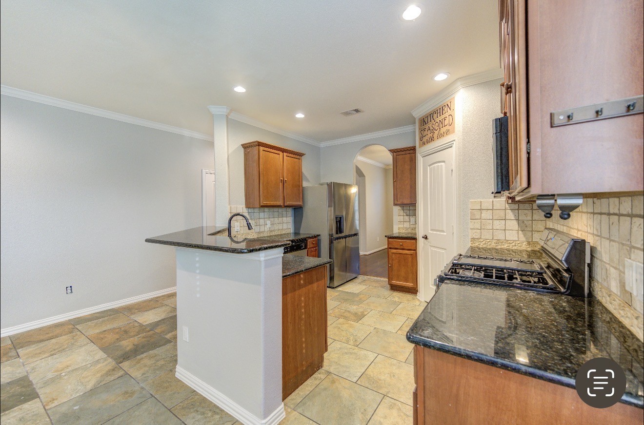 7 Maple Mill Court Conroe, TX 77301 - Photo 20 of 49 a spacious bathroom with a granite countertop sink and a mirror