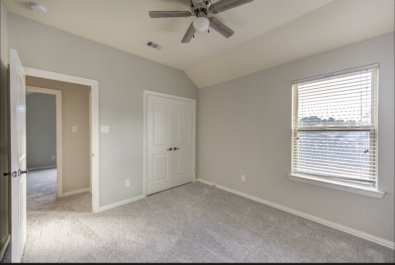 7 Maple Mill Court Conroe, TX 77301 - Photo 44 of 49 a view of an empty room with a window