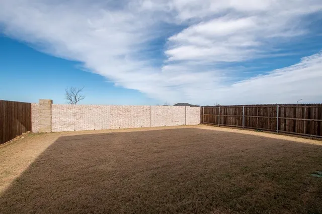 a view of an empty space and balcony
