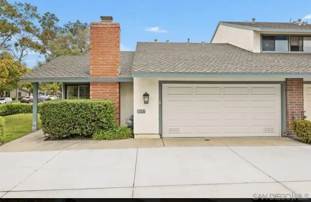 a house view with a outdoor space
