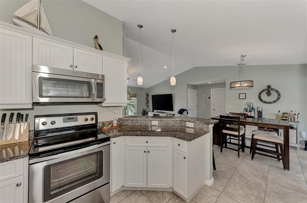 8 Amidship Road Placida, FL 33946 - Photo 12 of 47 a kitchen with a stove and a microwave