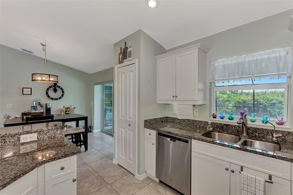 8 Amidship Road Placida, FL 33946 - Photo 15 of 47 a kitchen with a sink and cabinets