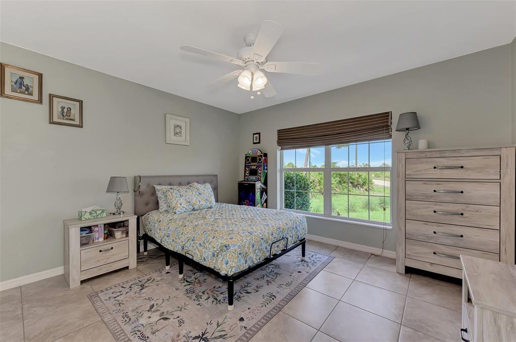 8 Amidship Road Placida, FL 33946 - Photo 26 of 47 a bedroom with a bed and a window