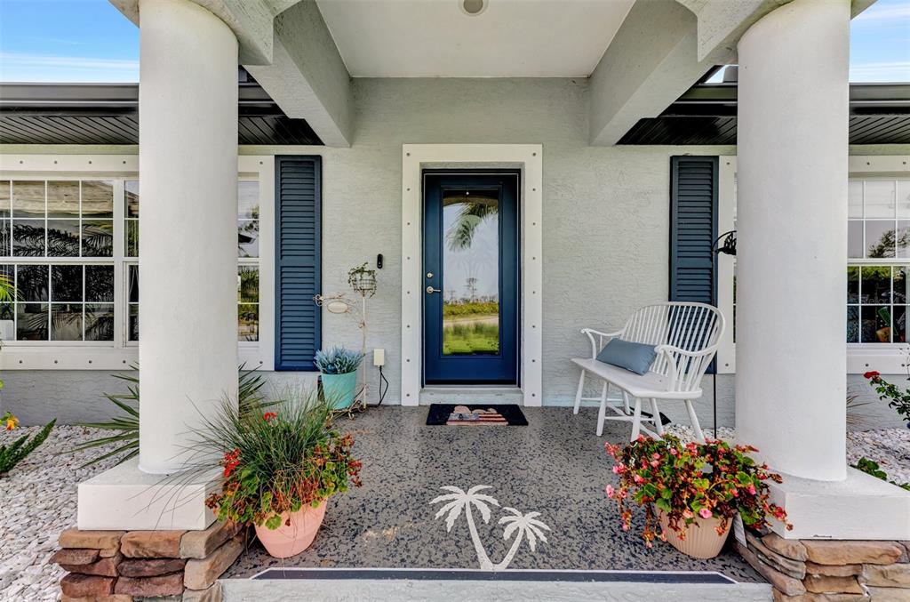 8 Amidship Road Placida, FL 33946 - Photo 3 of 47 a front view of a house with outdoor seating
