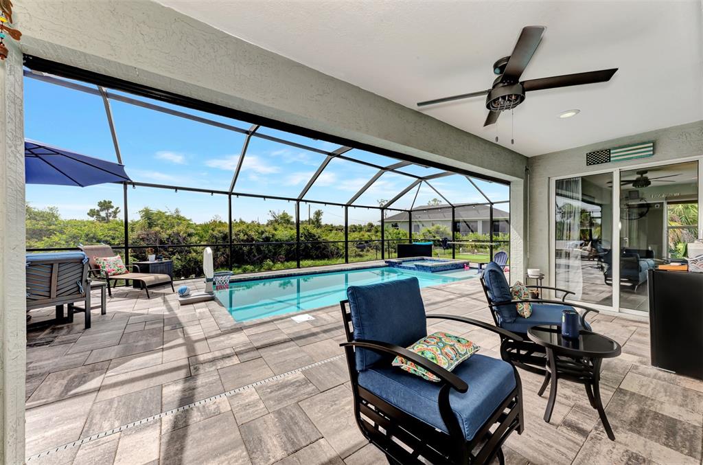 8 Amidship Road Placida, FL 33946 - Photo 33 of 47 a view of a patio with a dining table and chairs