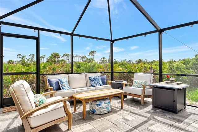 a view of a back yard of the house