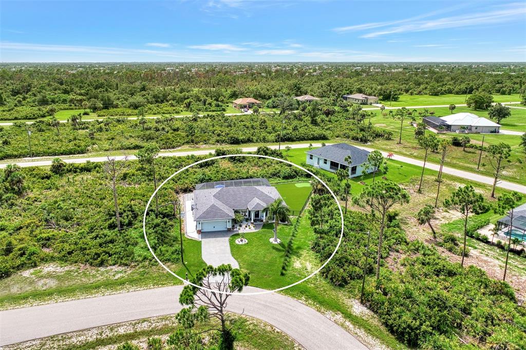 8 Amidship Road Placida, FL 33946 - Photo 42 of 47 an aerial view of residential houses with outdoor space and trees
