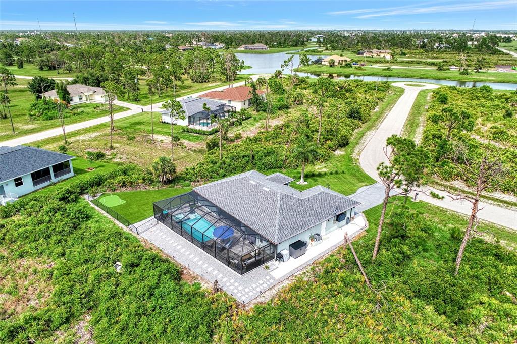 8 Amidship Road Placida, FL 33946 - Photo 46 of 47 an aerial view of a house with a garden