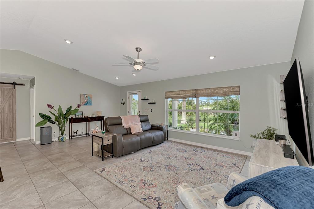 8 Amidship Road Placida, FL 33946 - Photo 6 of 47 a living room with furniture and a flat screen tv