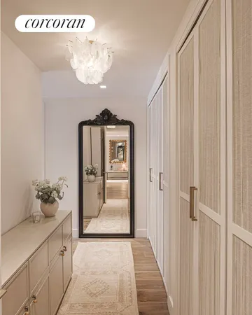 a bathroom with a double vanity sink a mirror and a bathtub