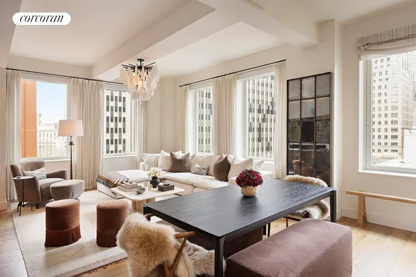 a very nice looking living room with a large window