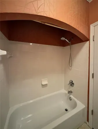 a bathroom with a bathtub