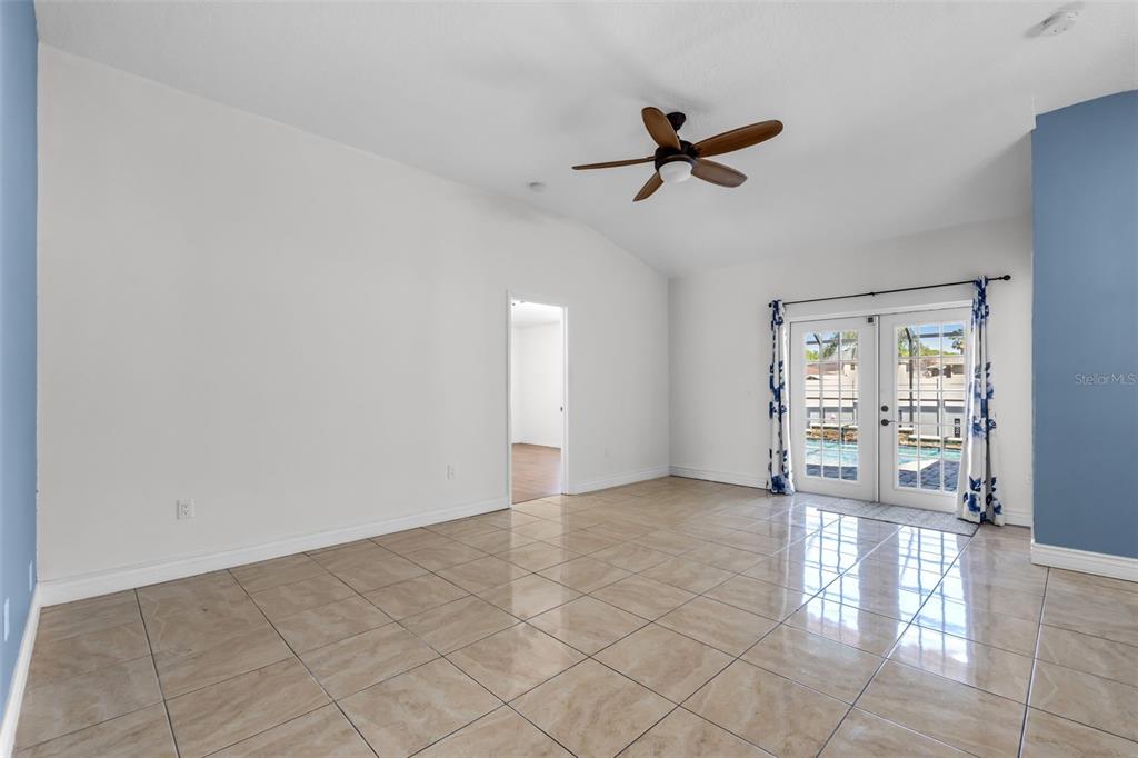 1424 Ocean Reef Road Wesley Chapel, FL 33544 - Photo 15 of 47 a view of an empty room with a window