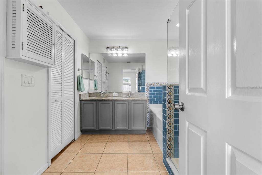 1424 Ocean Reef Road Wesley Chapel, FL 33544 - Photo 25 of 47 a kitchen with a refrigerator and a sink