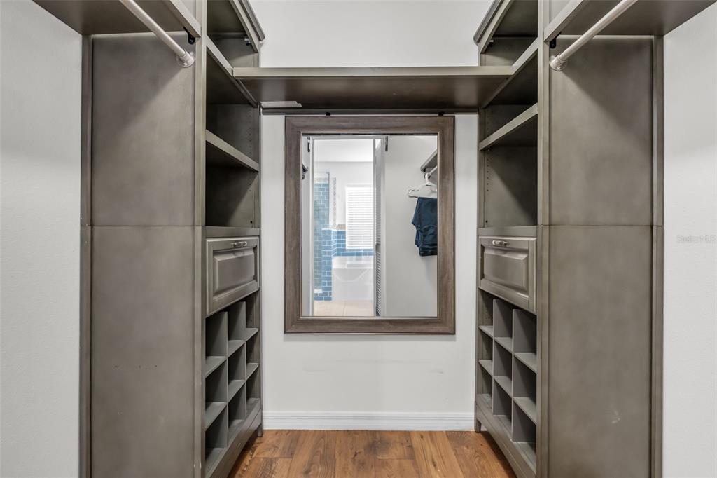 1424 Ocean Reef Road Wesley Chapel, FL 33544 - Photo 29 of 47 a view of walk in closet with empty racks