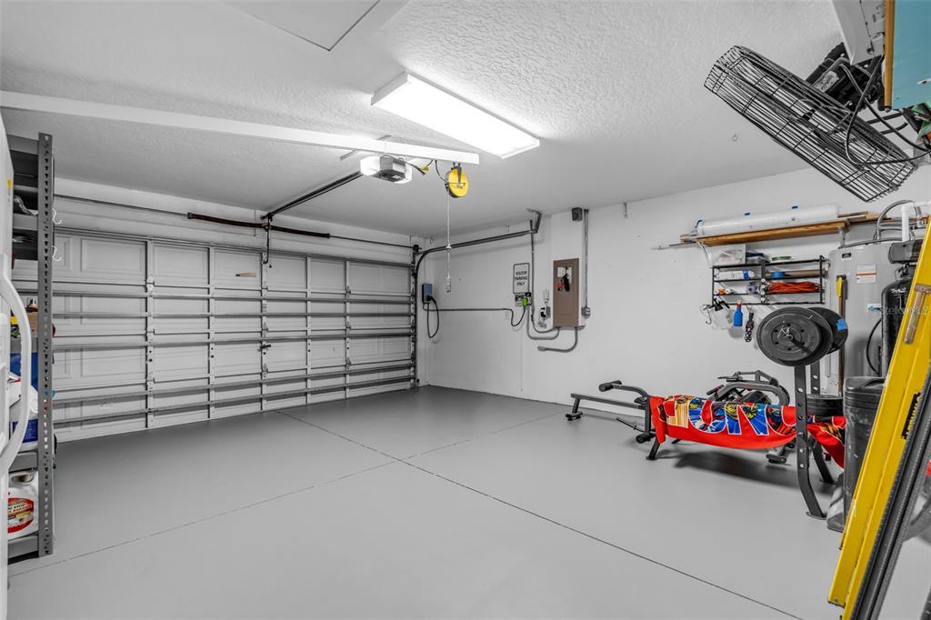 1424 Ocean Reef Road Wesley Chapel, FL 33544 - Photo 31 of 47 a view of a garage with storage