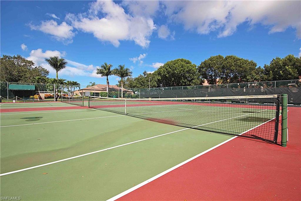 322 Melrose Place, Unit 31 Naples, FL 34104 - Photo 18 of 18 a view of an outdoor space and tennis court