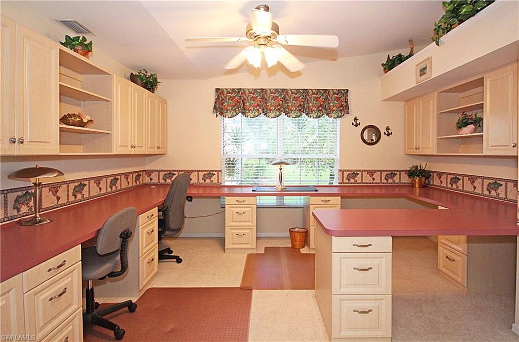 322 Melrose Place, Unit 31 Naples, FL 34104 - Photo 7 of 18 a room with a table chairs and a view of living room