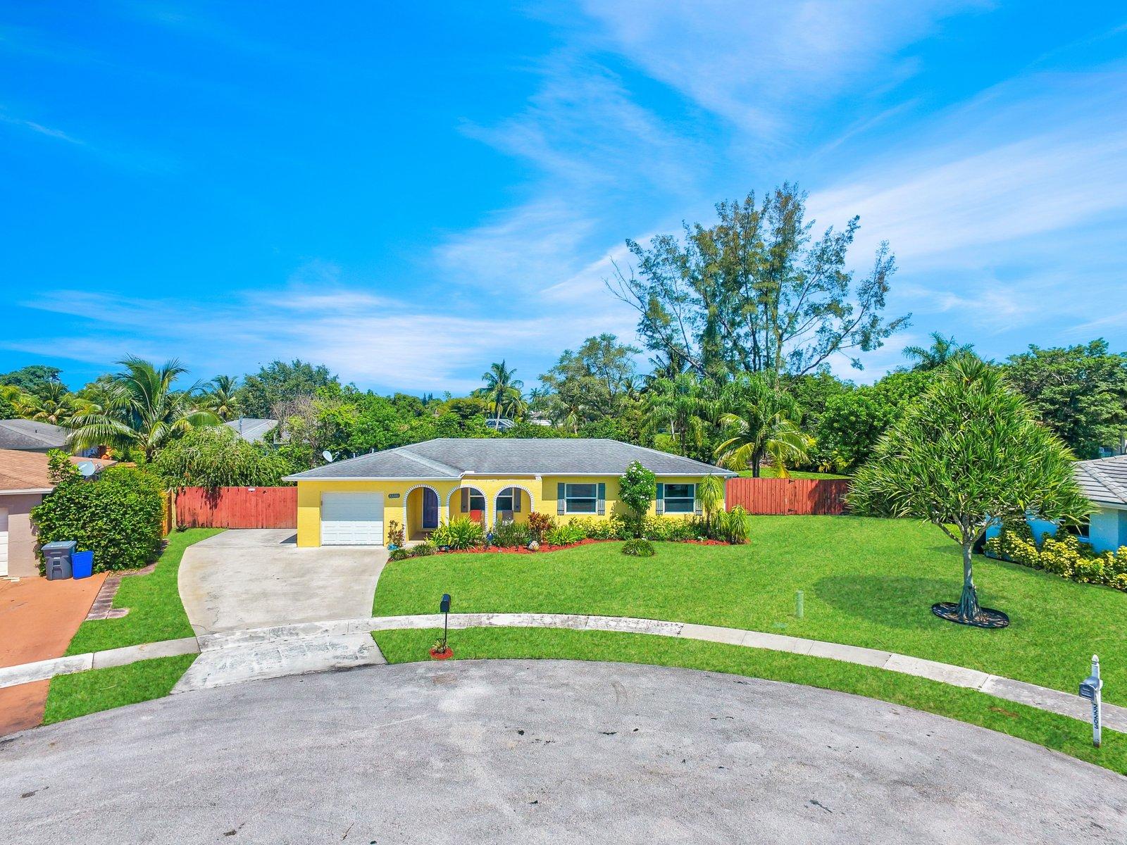 22206 Aquila Street Boca Raton, FL 33428 - Photo 1 of 73 a view of an outdoor space and a yard
