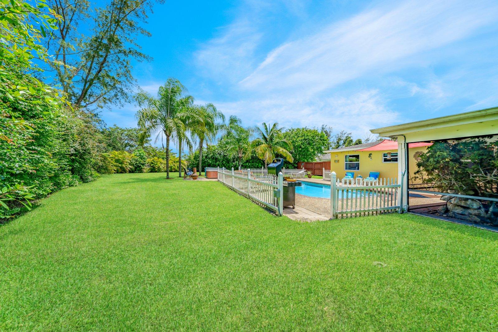 22206 Aquila Street Boca Raton, FL 33428 - Photo 3 of 73 a view of a garden with a house