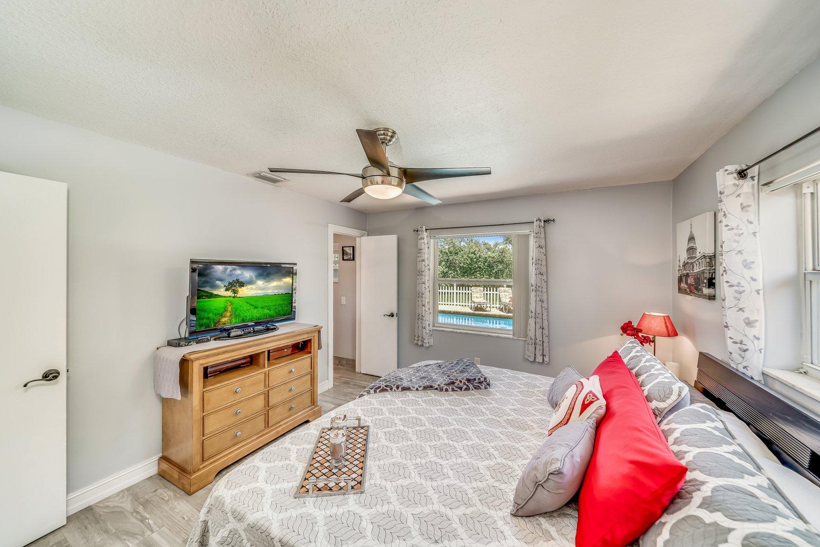 22206 Aquila Street Boca Raton, FL 33428 - Photo 31 of 73 a living room with furniture and a flat screen tv