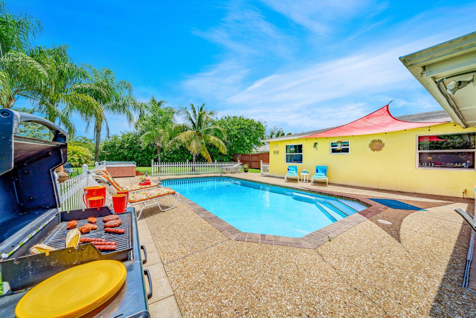 22206 Aquila Street Boca Raton, FL 33428 - Photo 4 of 73 swimming pool view with seating space