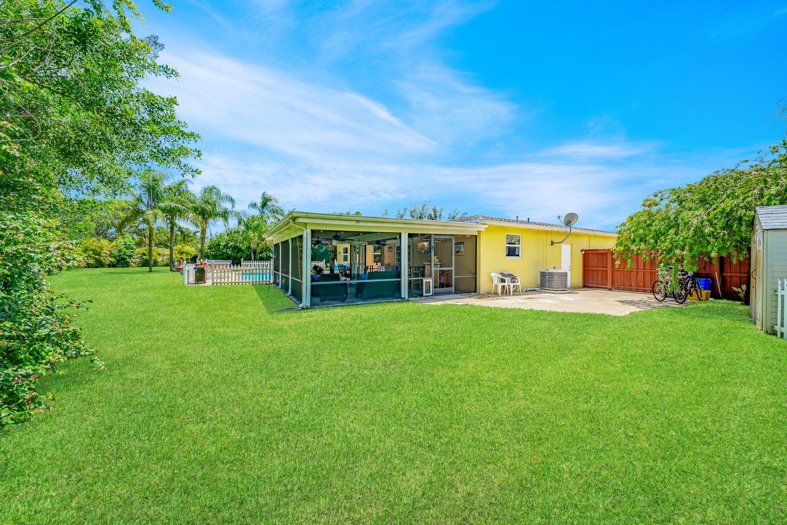 22206 Aquila Street Boca Raton, FL 33428 - Photo 45 of 73 a view of a house with a big yard