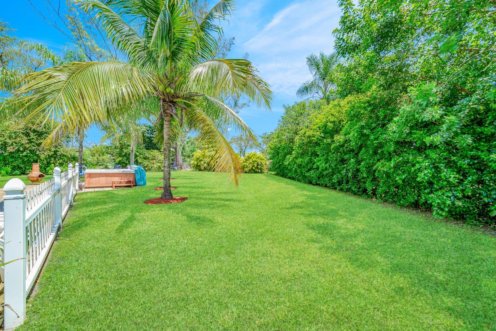 22206 Aquila Street Boca Raton, FL 33428 - Photo 57 of 73 a view of a park and palm trees