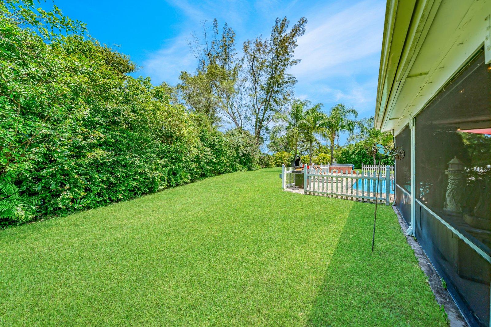 22206 Aquila Street Boca Raton, FL 33428 - Photo 60 of 73 a view of a garden from a balcony