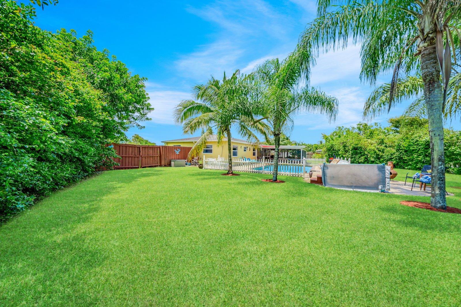 22206 Aquila Street Boca Raton, FL 33428 - Photo 64 of 73 a view of garden with patio