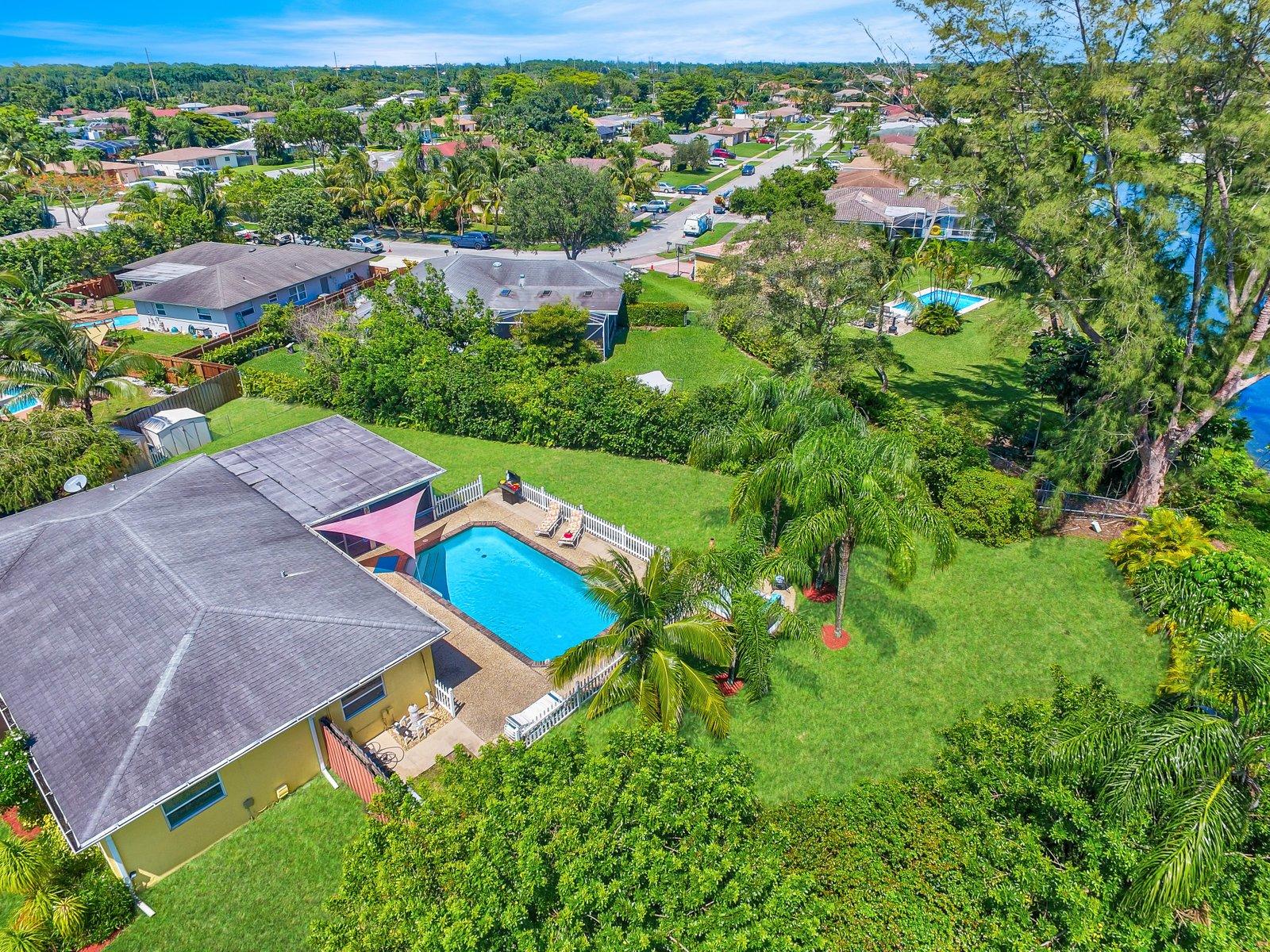 22206 Aquila Street Boca Raton, FL 33428 - Photo 65 of 73 an aerial view of a house with garden space and street view