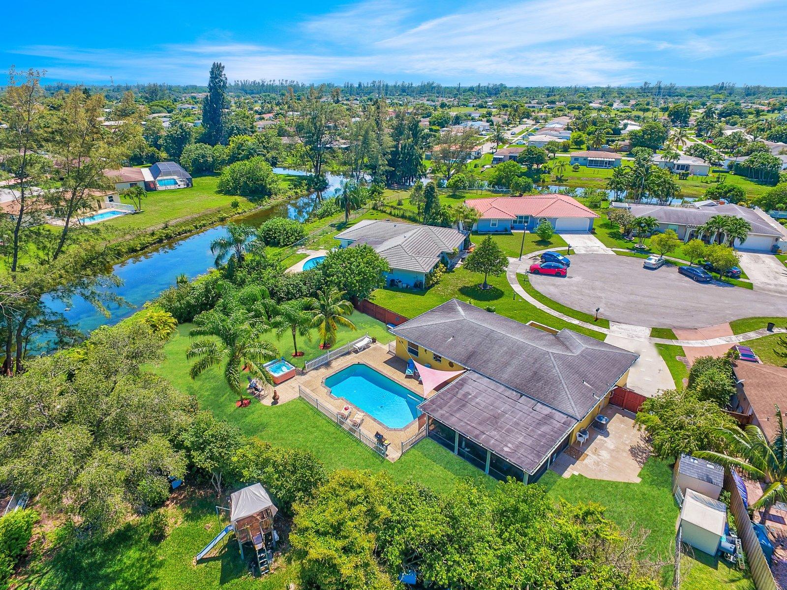 22206 Aquila Street Boca Raton, FL 33428 - Photo 69 of 73 an aerial view of residential houses with outdoor space and street view