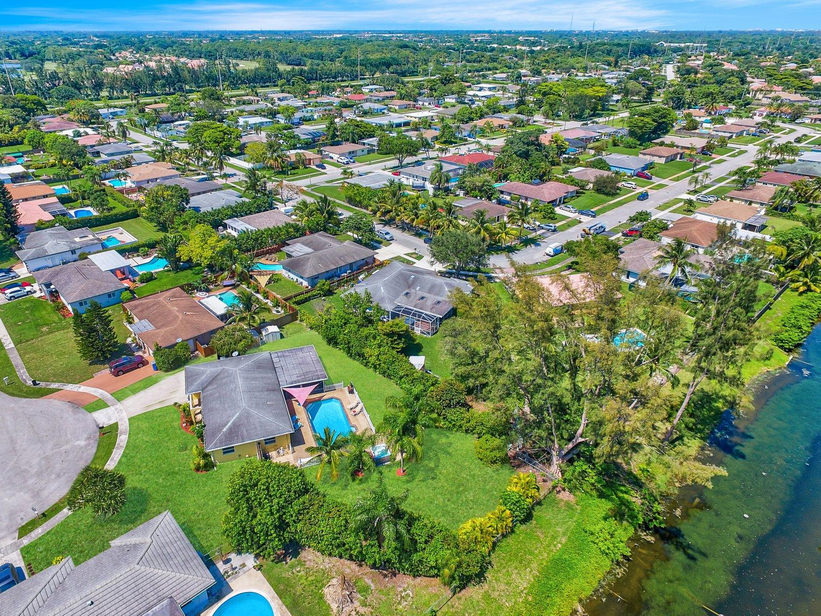 22206 Aquila Street Boca Raton, FL 33428 - Photo 70 of 73 an aerial view of residential houses with outdoor space and trees