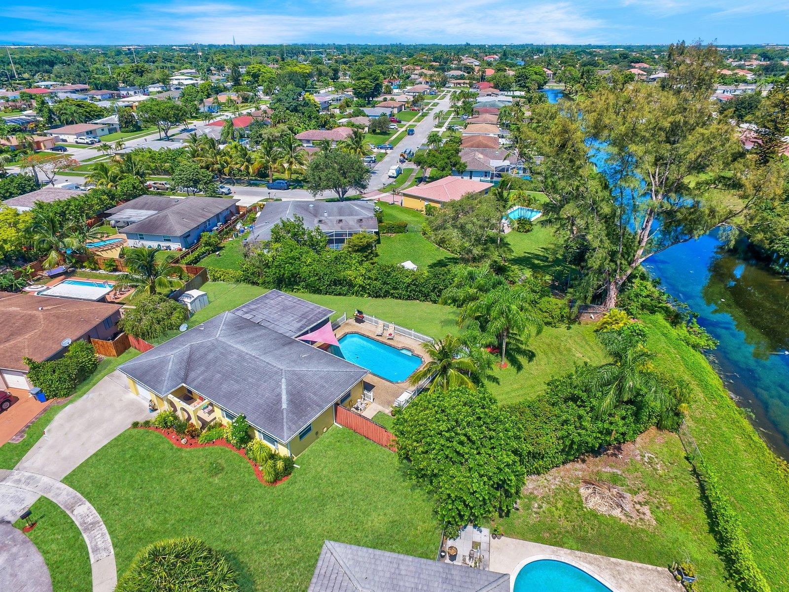 22206 Aquila Street Boca Raton, FL 33428 - Photo 72 of 73 an aerial view of residential houses with outdoor space and street view