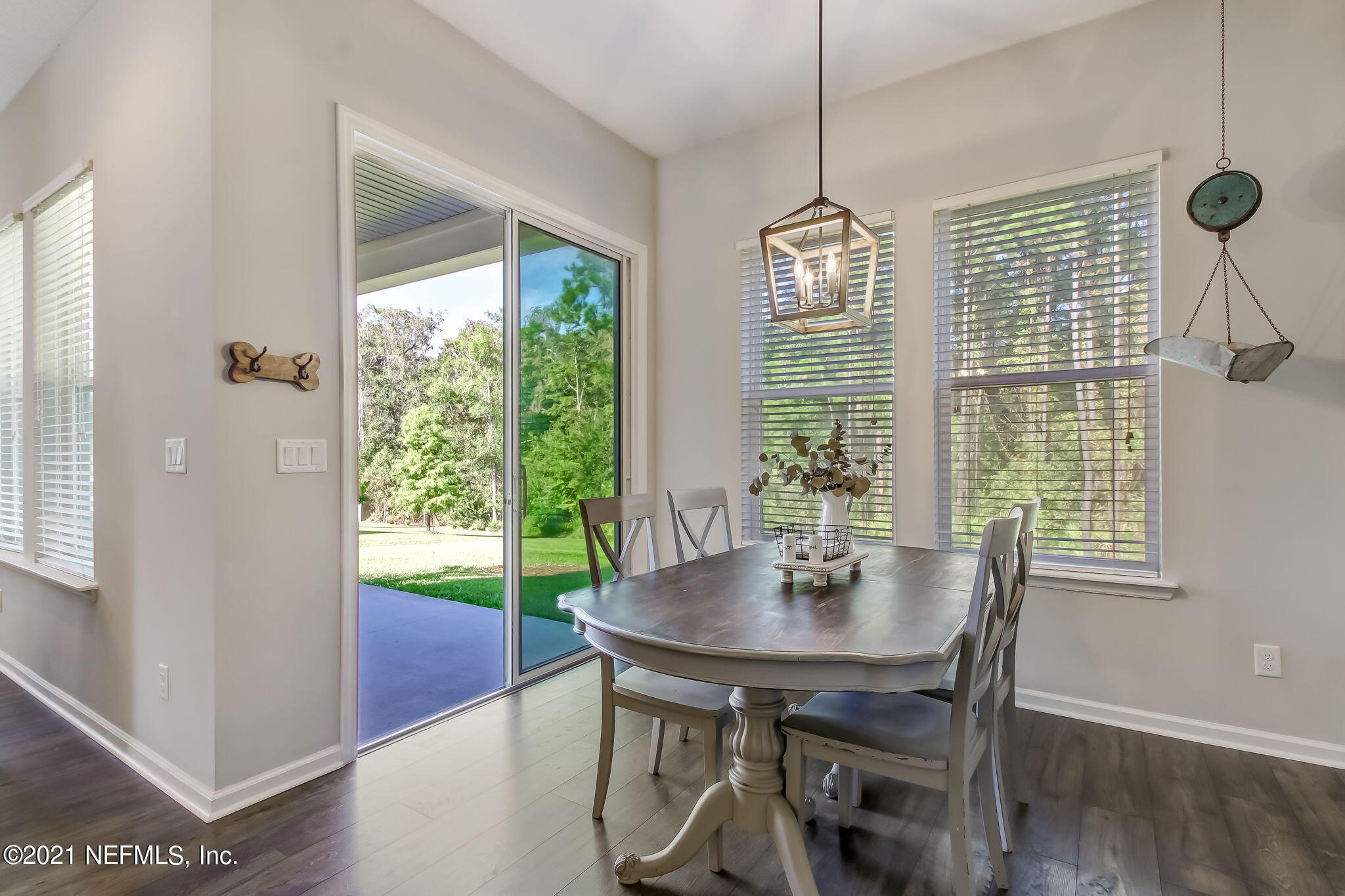 33 Adler Place St. Johns, FL 32259 - Photo 13 of 82 a view of a dining room with furniture window and wooden floor