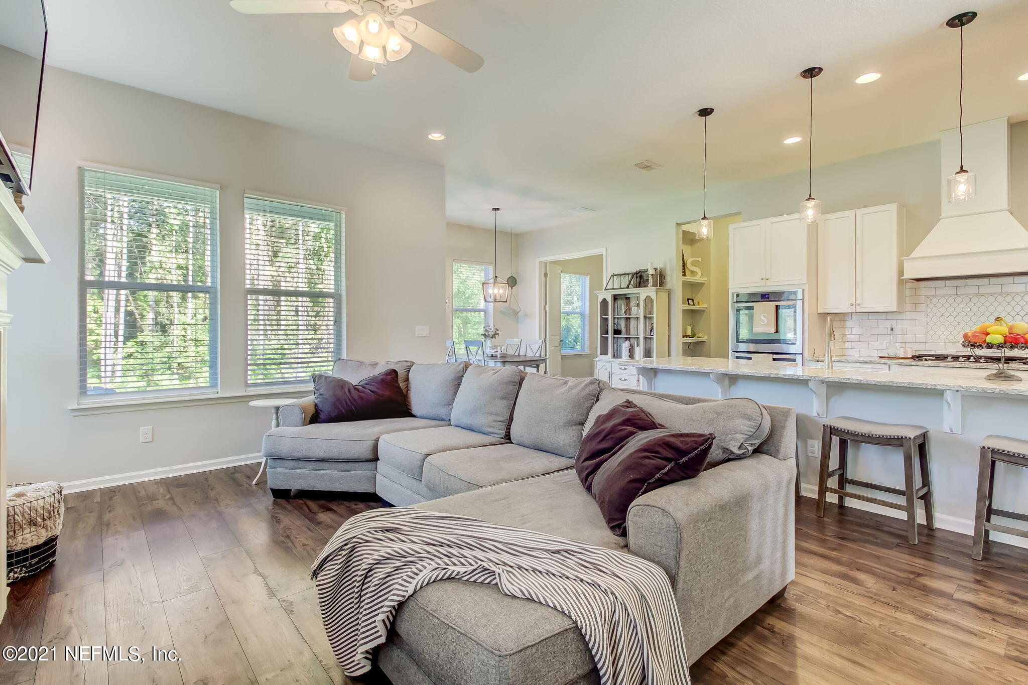 33 Adler Place St. Johns, FL 32259 - Photo 18 of 82 a living room with furniture and a large window