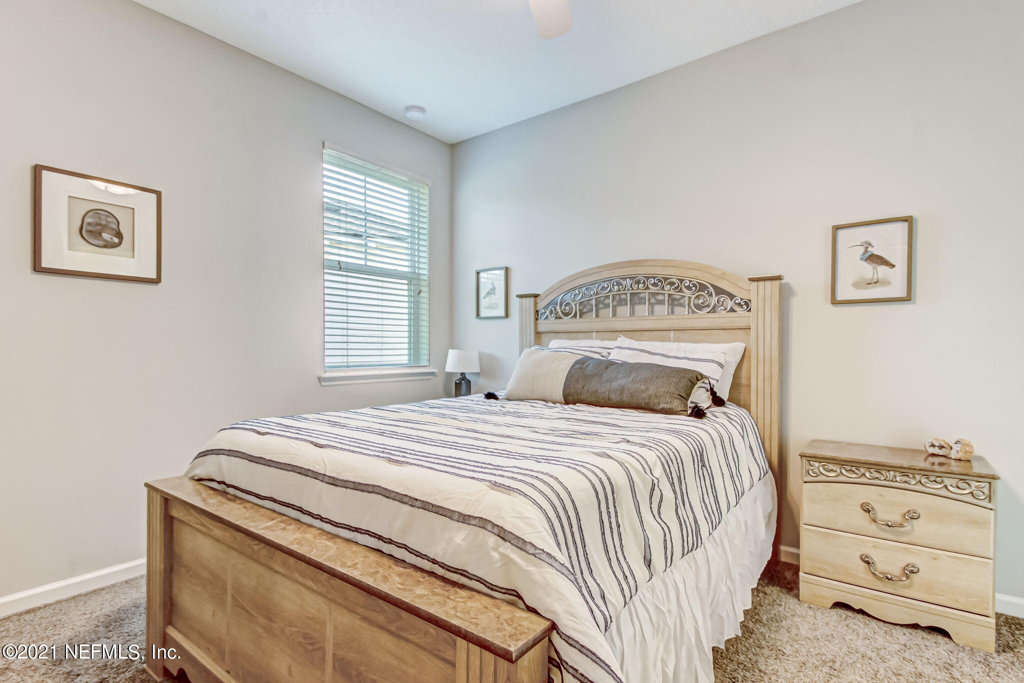 33 Adler Place St. Johns, FL 32259 - Photo 28 of 82 a bedroom with a bed and a window