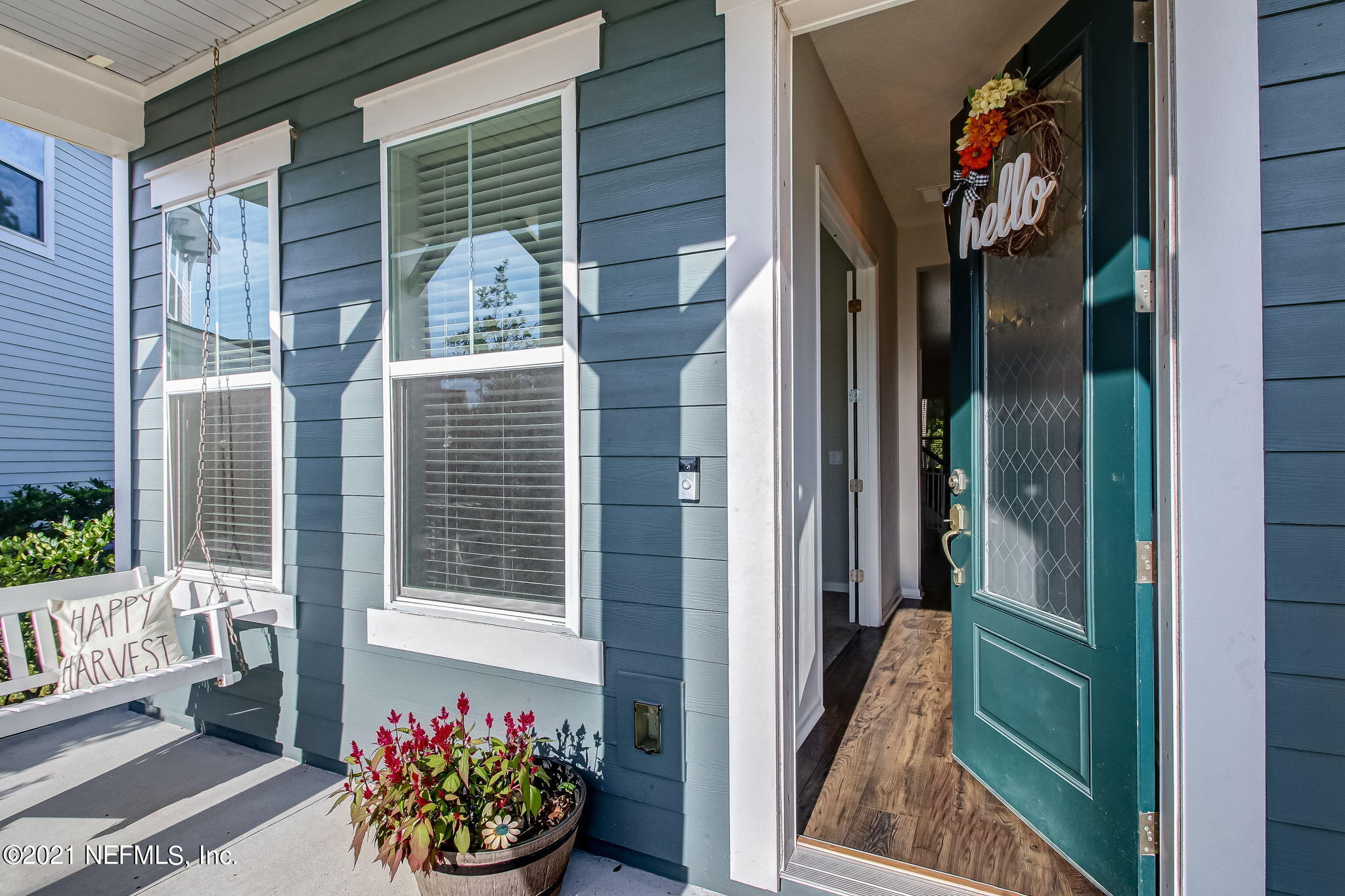 33 Adler Place St. Johns, FL 32259 - Photo 4 of 82 a bunch of flowers in front of a house