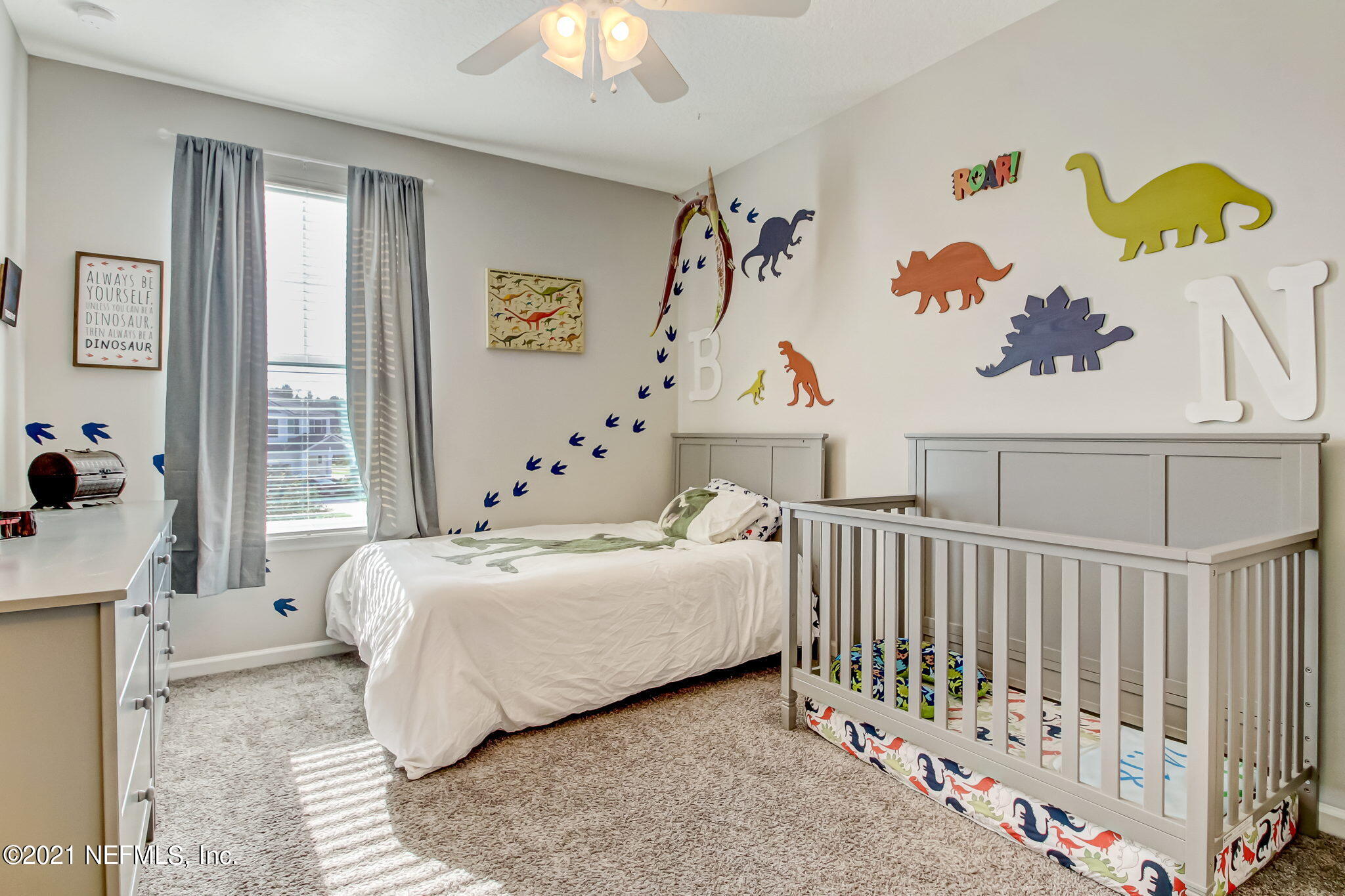 33 Adler Place St. Johns, FL 32259 - Photo 33 of 82 a bedroom with a bed and a window