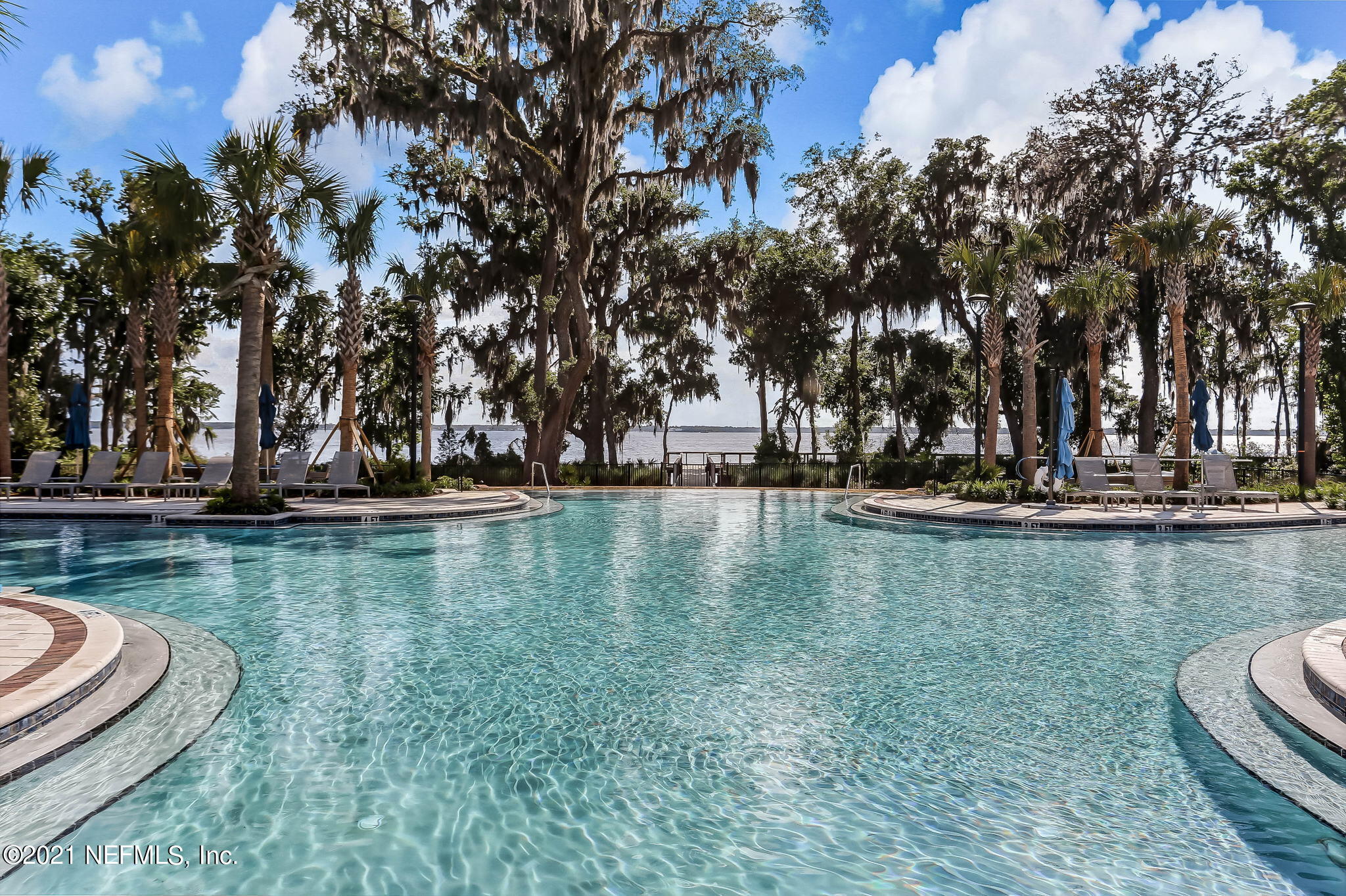 33 Adler Place St. Johns, FL 32259 - Photo 60 of 82 a view of a swimming pool with outdoor seating
