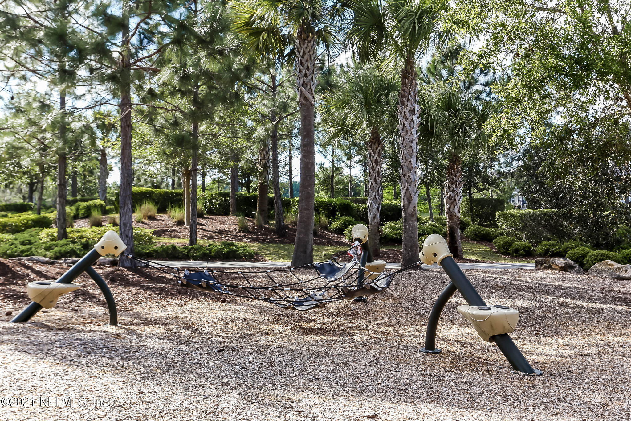 33 Adler Place St. Johns, FL 32259 - Photo 69 of 82 a view of a park with swings and slides